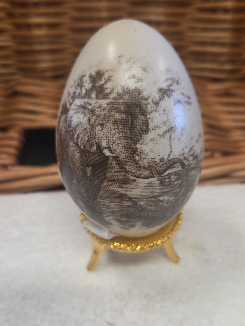 Handcrafted White Ceramic Egg with Brown Elephant Motif